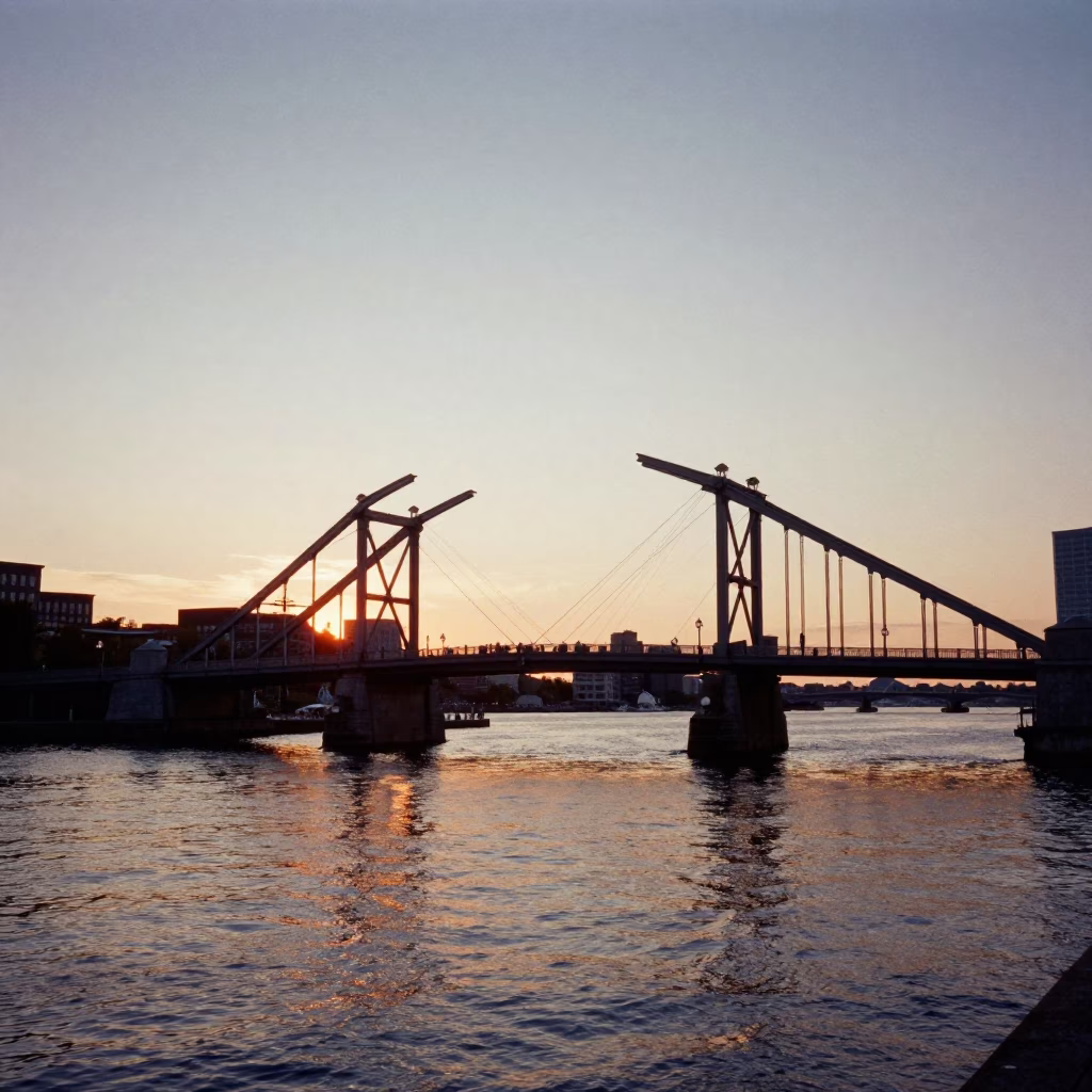 Boston Harbor Evening Light with Historic Drawbridge and Sailing Ship in in Boston, Massachusetts, United States