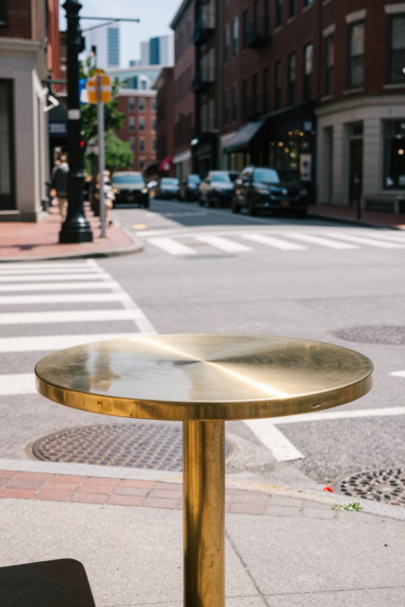Boston Massachusetts Midday Street Scene with Polished Brass Tabletop and Urban Background in in Boston, Massachusetts, United States