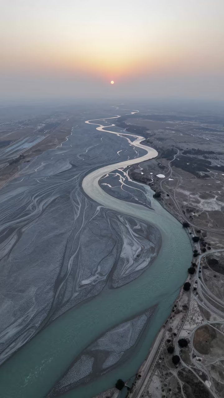 Braided Glacial Rivers Sunset Winter Aerial View in far above river meanders near Sheikhupura