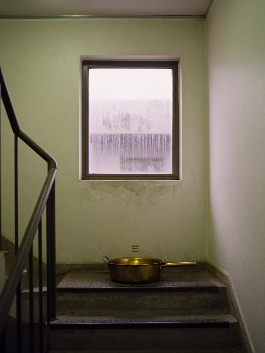 Brass Catch Pan in Chilean Bunker Stairwell in inside a bunker stairwell in Chile
