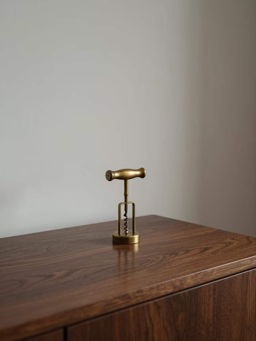 Brass Corkscrew on Polished Sideboard in Dundo in on a hotel dresser in Dundo