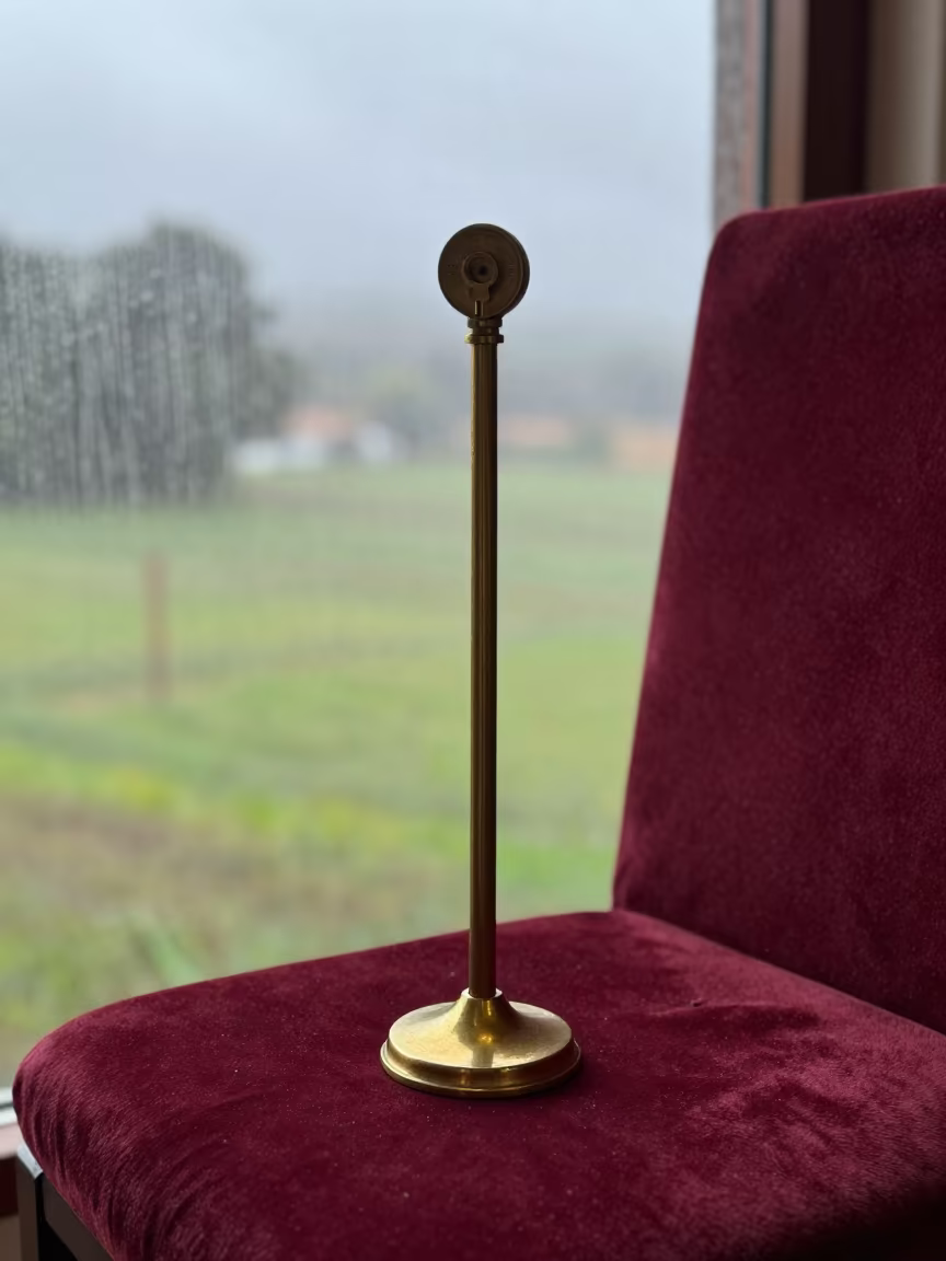 Brass Inclinometer on Velvet Chair La Asunción in on a velvet chair in La Asunción