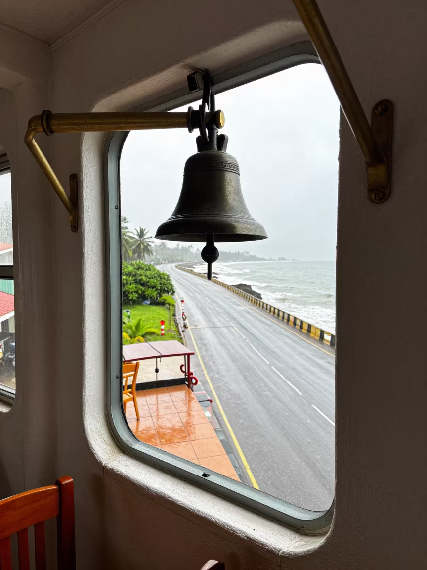 Brass Ship Bell Ghana Switchback Monsoon Window in along a switchback approach in Ghana