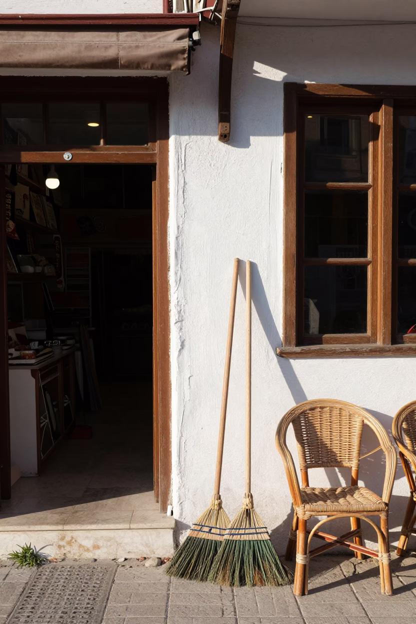 Bright Late Morning in Izmir Turkey with Brooms and Rattan Chair in in Izmir, Turkey