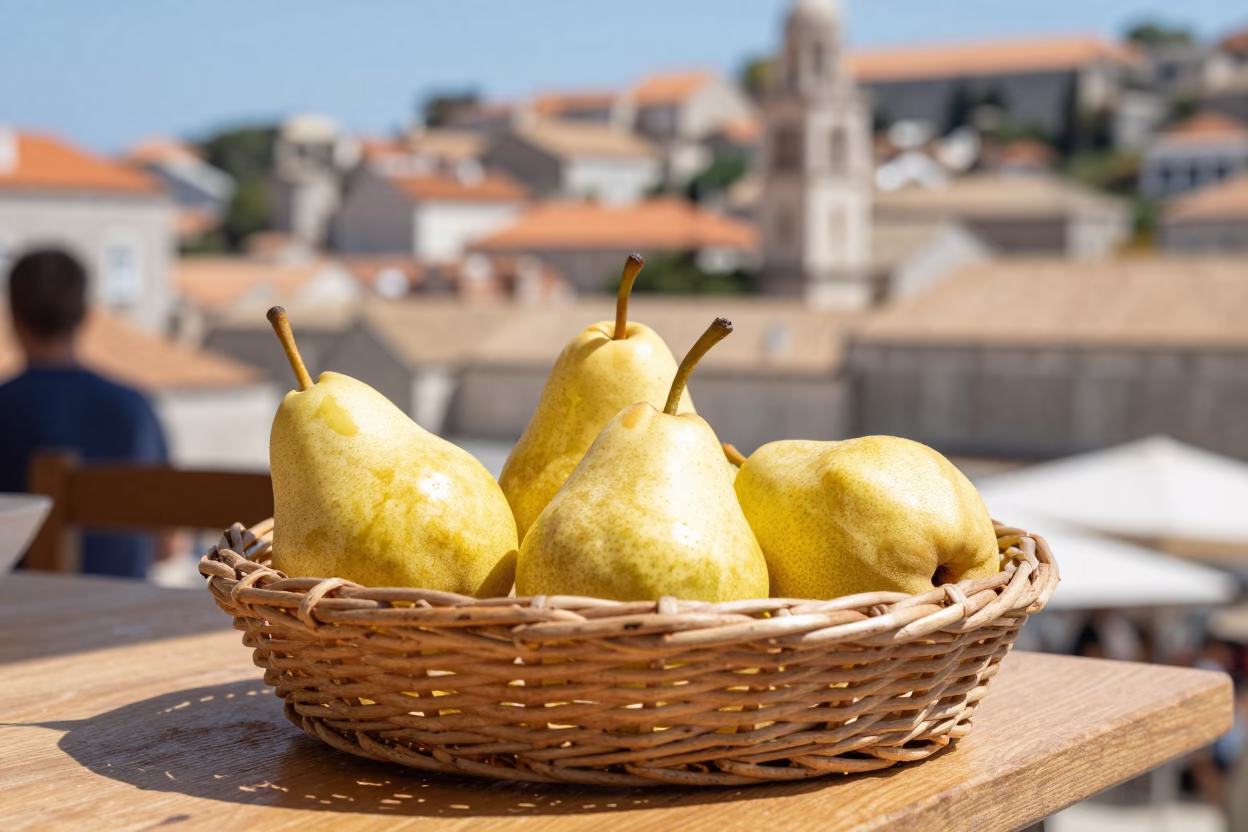 Bright Midmorning Dubrovnik Street Scene with Pears on Wooden Stall and Stone Architecture in in Dubrovnik, Croatia