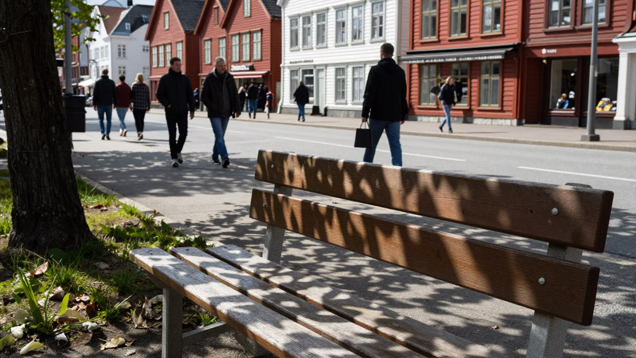 Bright Midmorning Street Scene in Bergen Norway with Leaf Shadows and Local Life in in Bergen, Norway