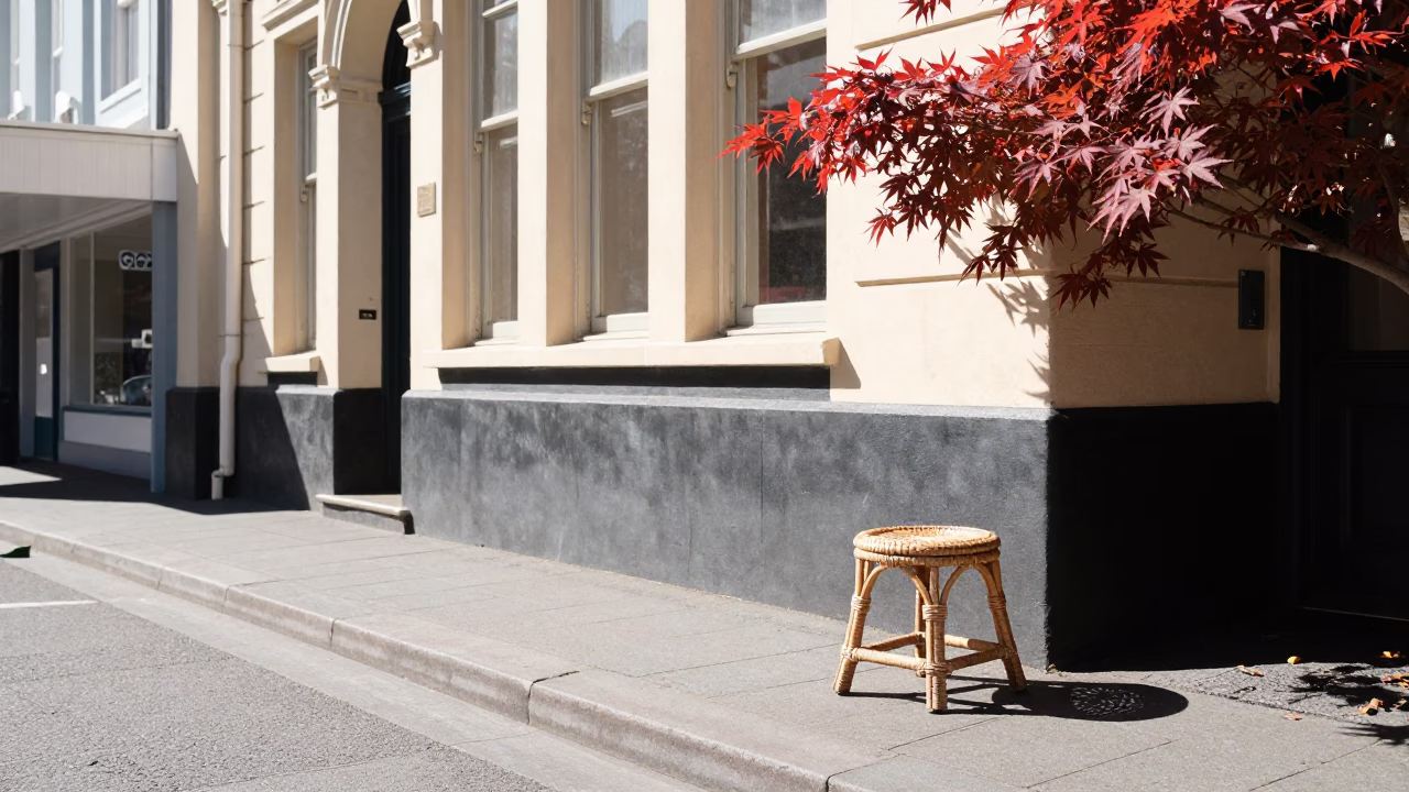 Bright Midmorning Street Scene in Christchurch New Zealand with Rattan Stool and Japanese Maple in in Christchurch, New Zealand