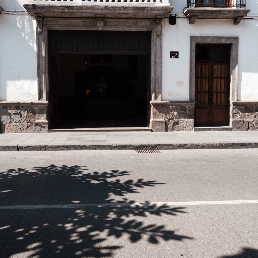 Bright midmorning street scene in Lima Peru with leaf shadows and candid local life in in Lima, Peru