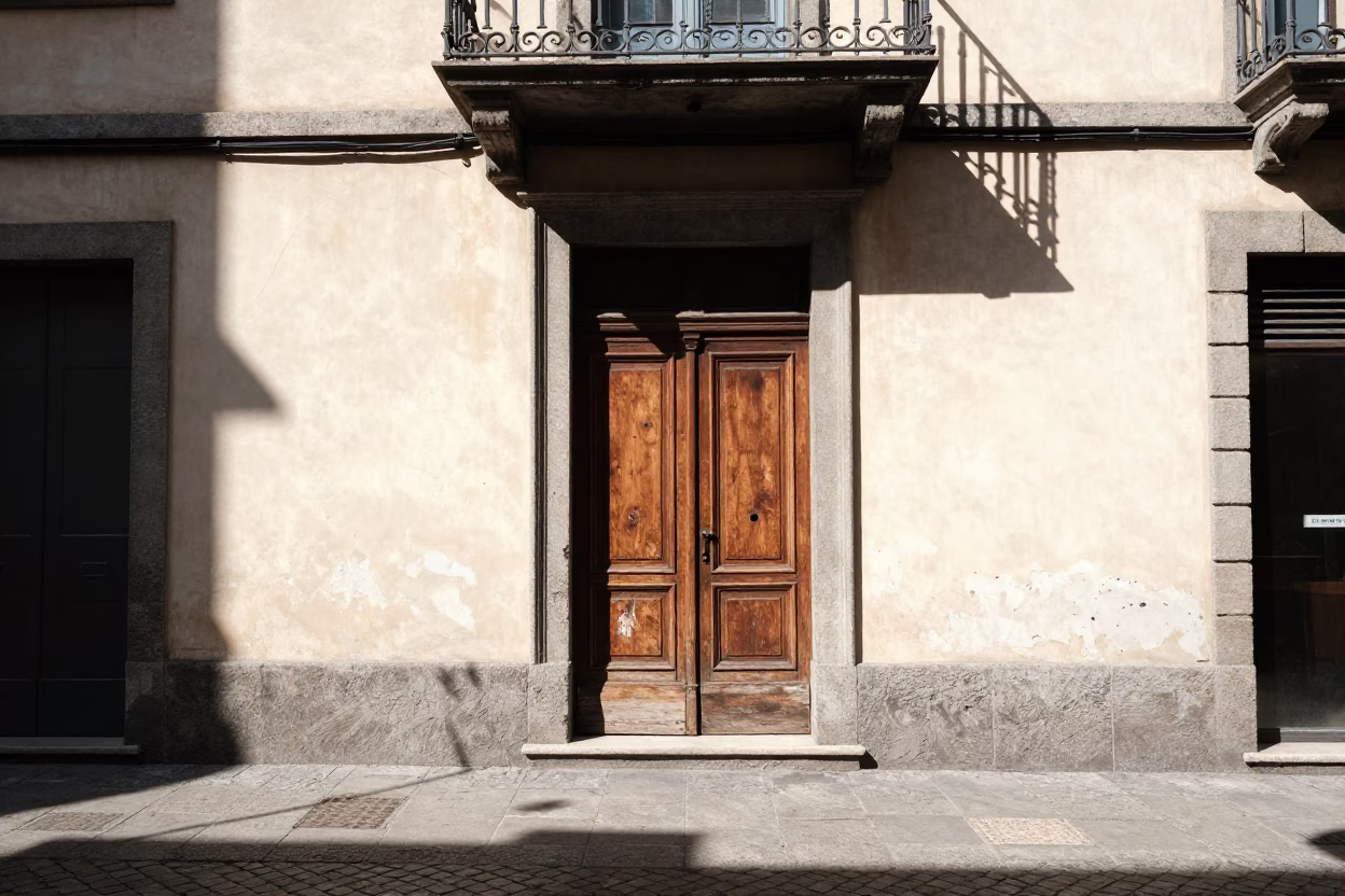 Bright Midmorning Street Scene in Milan Italy with Wicker Shadow on Doorframe in in Milan, Italy