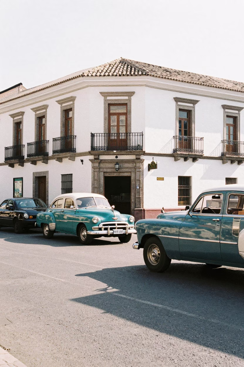 Bright Midmorning Street Scene in Quito Ecuador with Vintage Cars and Colonial Architecture in in Quito, Ecuador