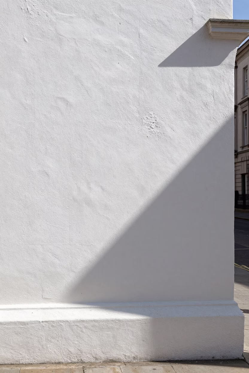 Bright Midmorning Sunlight Striking Plaster Wall in Liverpool United Kingdom Street Scene in in Liverpool, United Kingdom