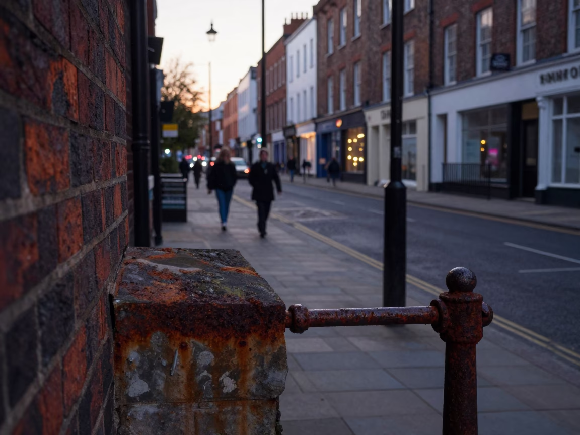 Bristol Dawn Street Scene with Rusty Railings and Early Commuters in United Kingdom in in Bristol, United Kingdom