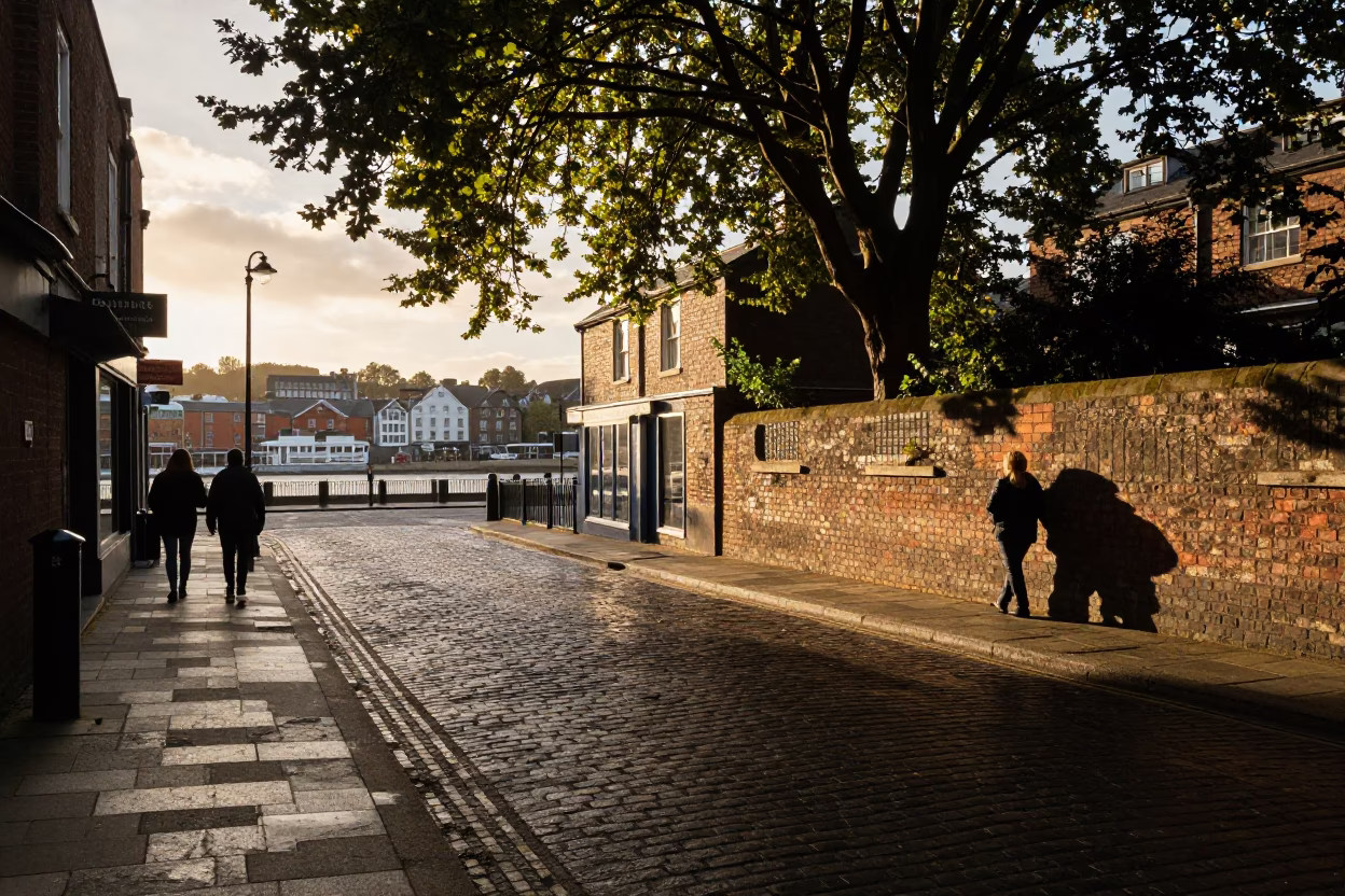 Bristol evening street scene with leaf shadows and local life in in Bristol, United Kingdom