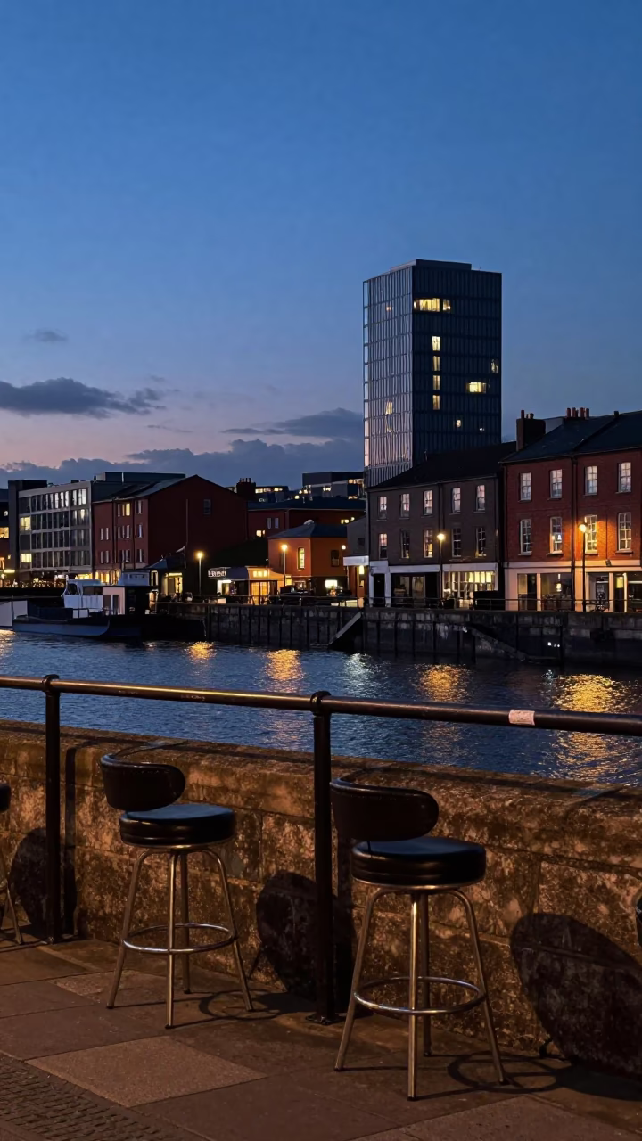 Bristol Harbor Blue Hour Street Photography with Bar Stools and City Lights in in Bristol, United Kingdom