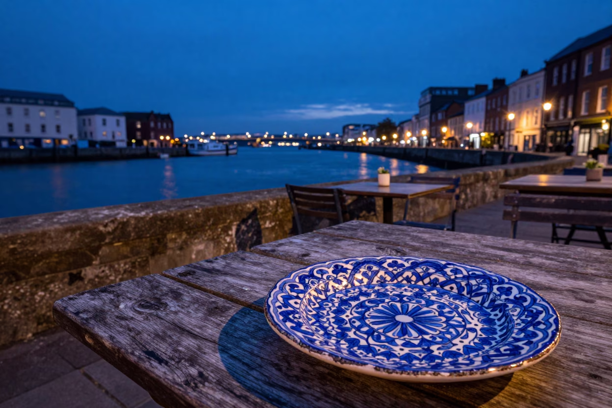 Bristol Harbor Twilight Scene with Vintage Majolica Plate and Olives on Table in in Bristol, United Kingdom
