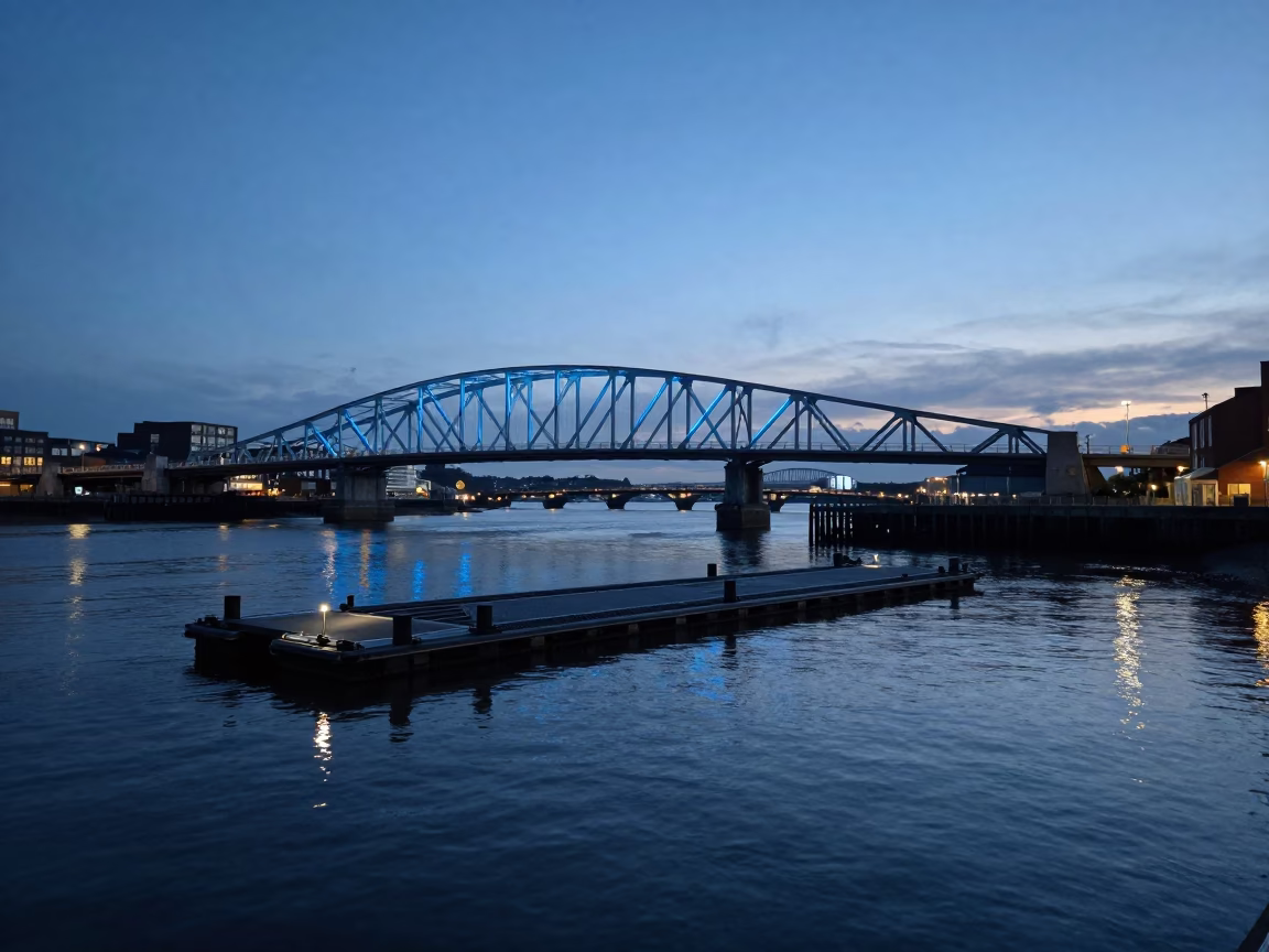 Bristol Harbour Evening Light Showing Floating Bridge and Tidal Channel in in Bristol, United Kingdom