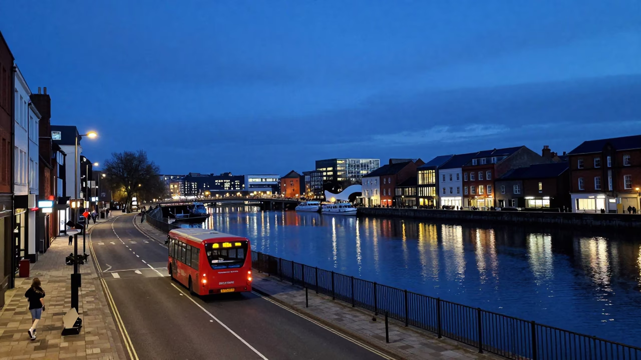 Bristol Harbourside Blue Hour Street Scene with Red Bus and Waterfront Reflections in in Bristol, United Kingdom