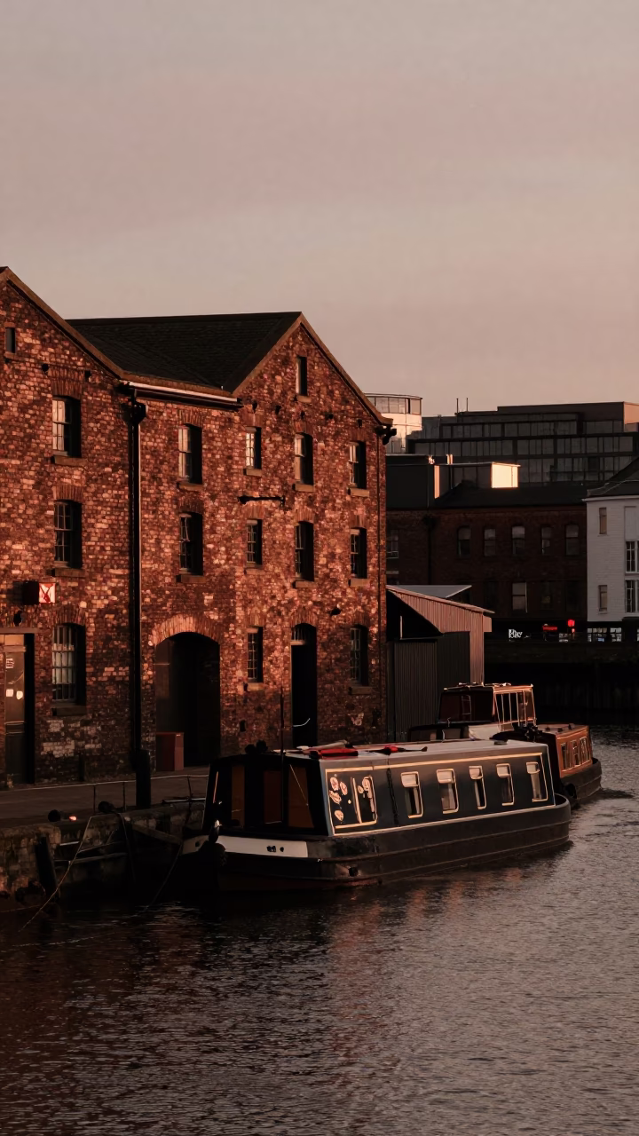 Bristol Harbourside Evening with Narrowboat Roses and Distant City Lights in in Bristol, United Kingdom