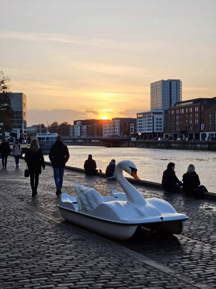 Bristol Harbourside Evening with Swan Pedal Boat and City Skyline in in Bristol, United Kingdom