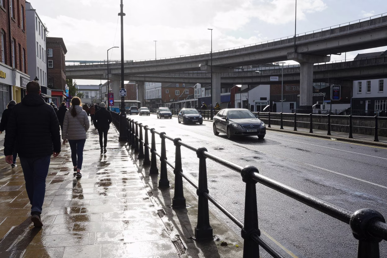 Bristol Harbourside Midday Street Scene with Condensation on Rail and Local Pedestrians in in Bristol, United Kingdom