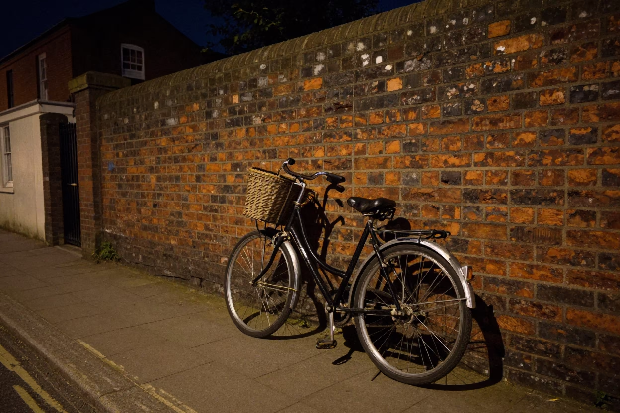 Bristol Night Street Scene Vintage Bicycle Against Brick Wall and Glowing Streetlamp in in Bristol, United Kingdom