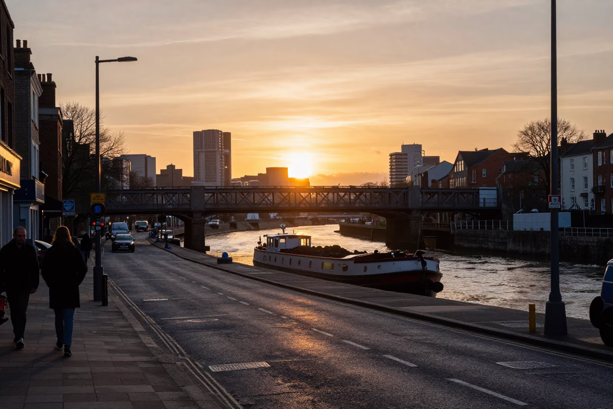 Bristol Sunset Street Scene with Coal Barge Under Railroad Bridge and Fruit Vendor in in Bristol, United Kingdom
