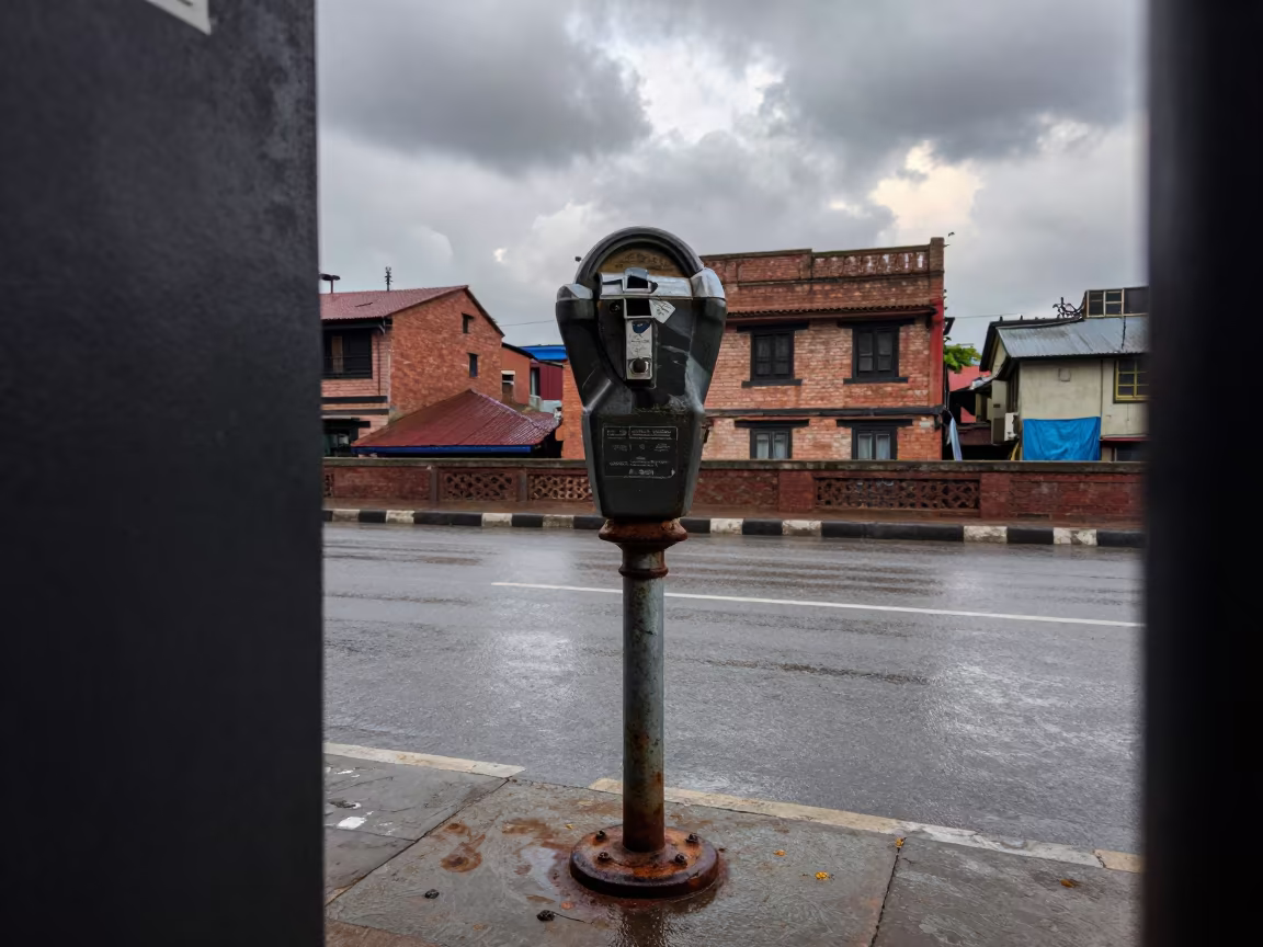 Broken Parking Meter Rain Curb Lalitpur in at a tram stop in Lalitpur