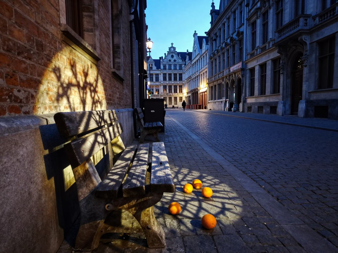 Brussels Blue Hour Street Scene with Wicker Shadow and Oranges on Cobblestone in in Brussels, Belgium