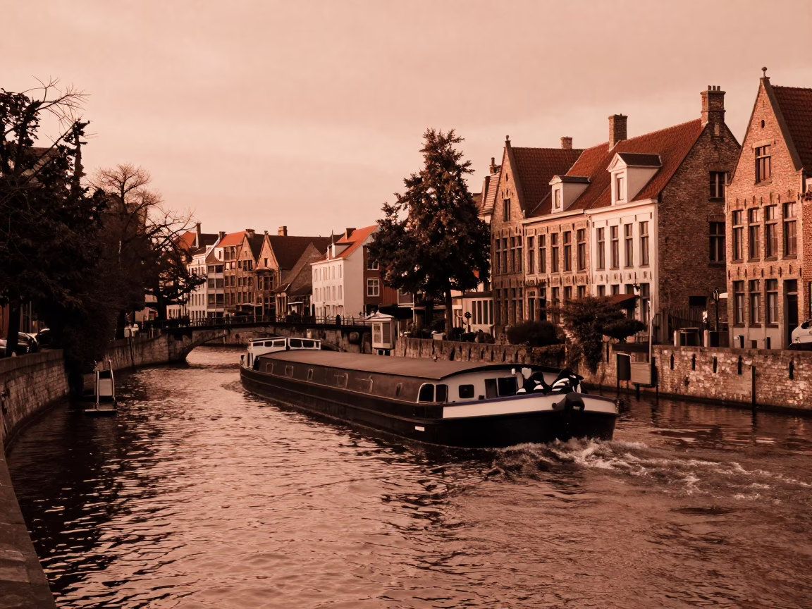 Brussels canal barge cargo in copper dusk light near Grand Place in in Brussels, Belgium