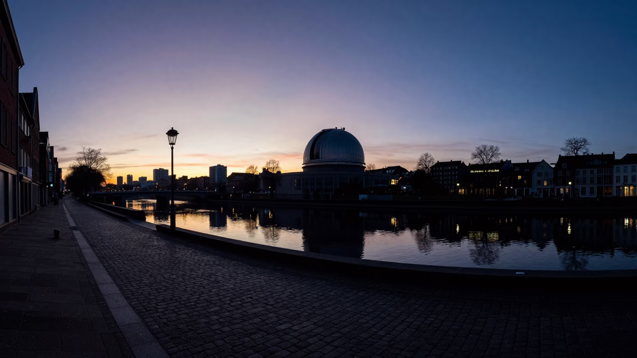 Brussels Twilight Observatory Dome Silhouette and Urban Canal Reflections in in Brussels, Belgium
