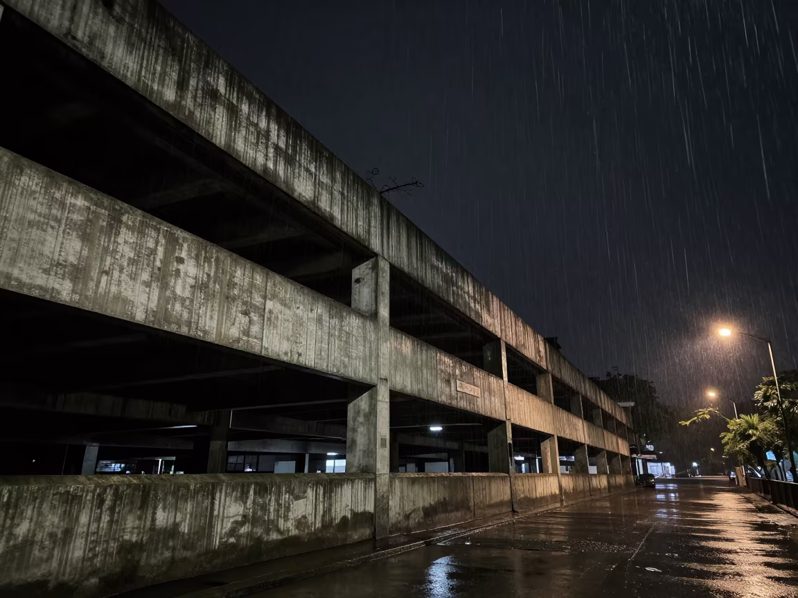 Brutalist Parking Structure Night Monsoon Kolkata in inside a restored train terminal in Park Street, Kolkata