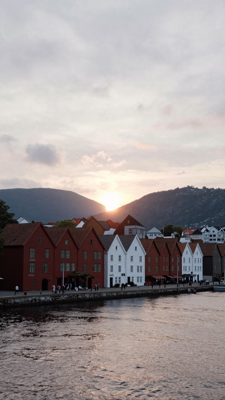 Bryggen Wharf in Bergen at As The Sun Drops Toward The Horizon in in Bergen, Norway