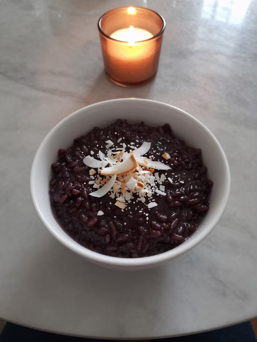 Bubur Ketan Hitam Bowl on Marble Table in on a marble cafe table in Monterrey