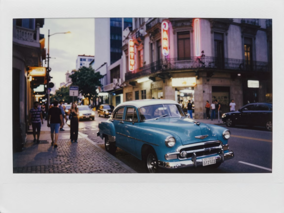 Buenos Aires Argentina Evening Street Scene with Neon Lights and Vintage Automobiles in in Buenos Aires, Argentina