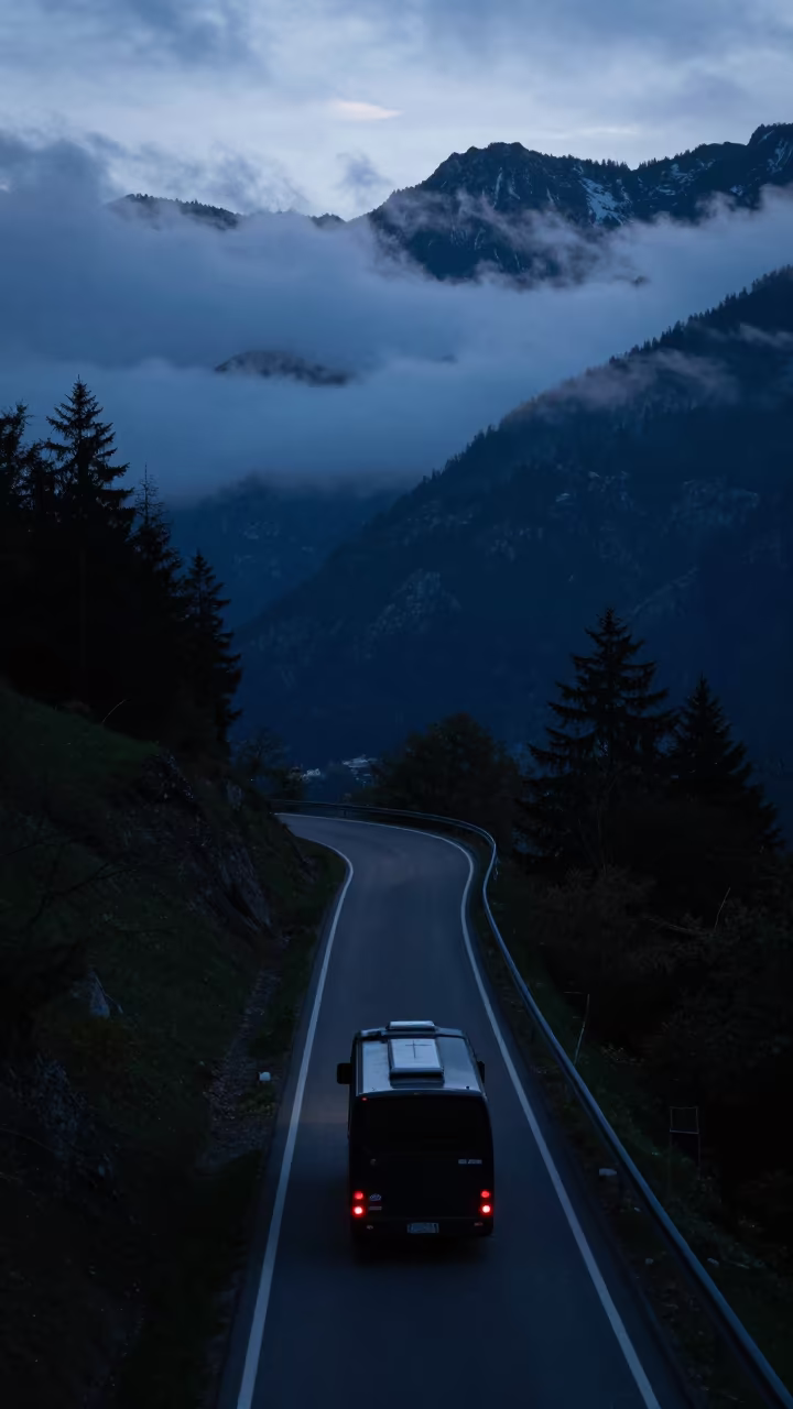 Silhouette of Bus on Austrian Mountain Switchback in in Austria