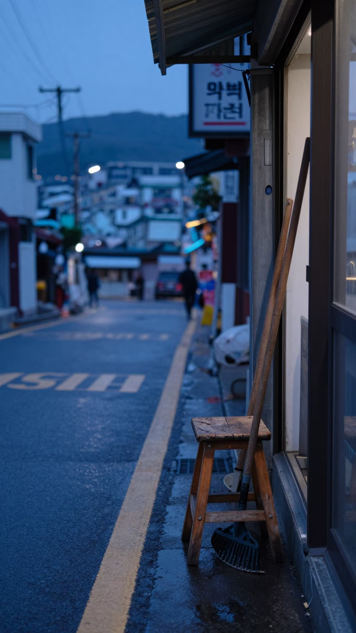 Busan Blue Hour Street Scene with Wooden Stool and Rake Heads in in Busan, South Korea