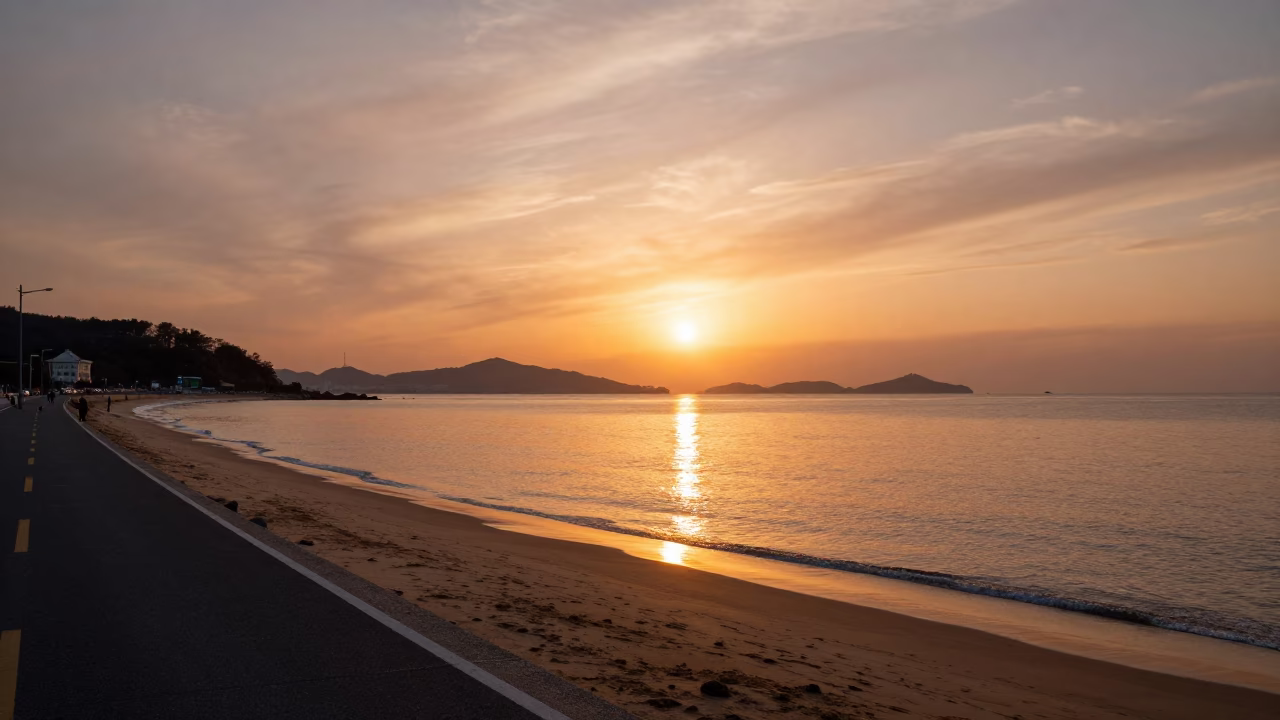 Busan Haeundae Beach Sunset Panorama with Coastal Road and City Skyline in in Busan, South Korea
