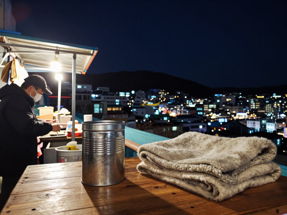 Busan Night Street Scene with Coffee Tin and Blanket Under Deep Sky in in Busan, South Korea