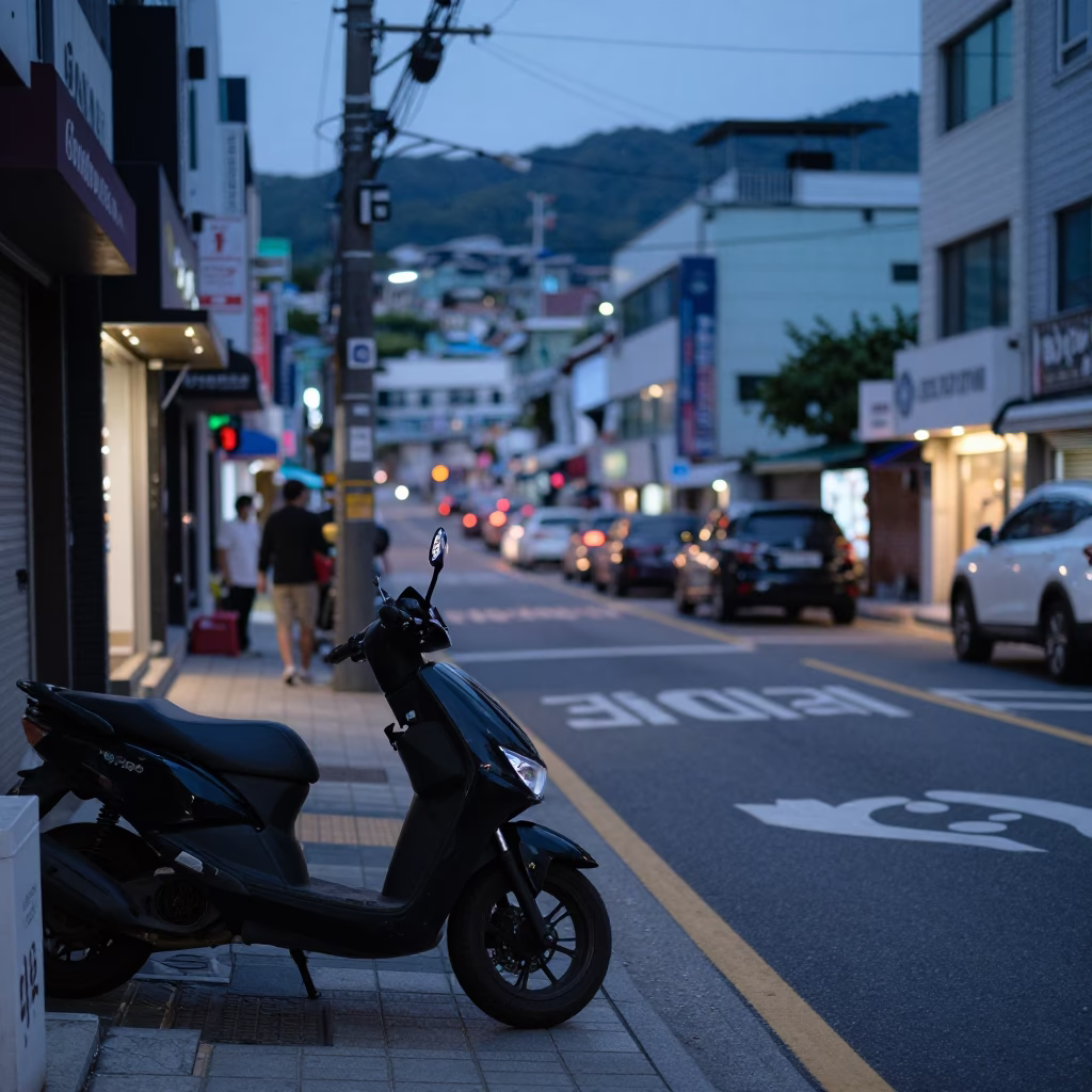 Busan South Korea Early Evening Street Scene with Motorcycle and Urban Details in in Busan, South Korea