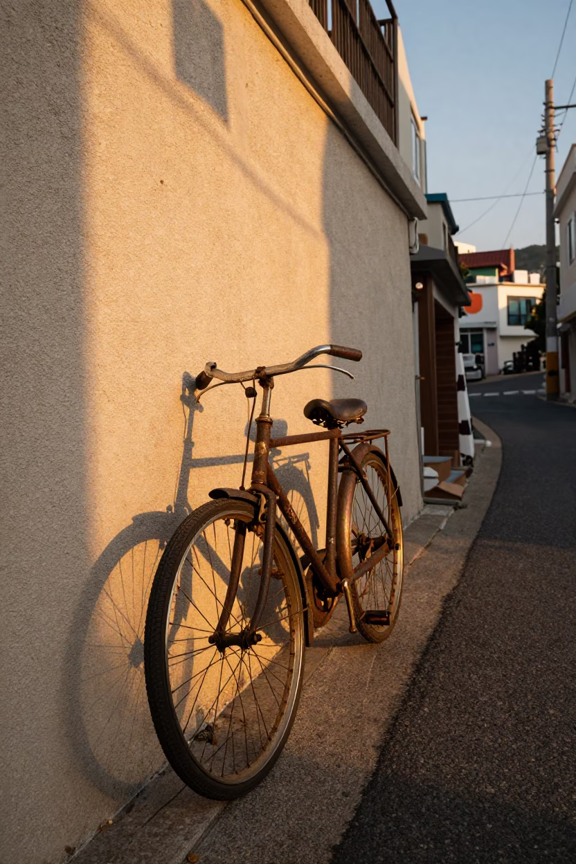 Busan South Korea Vintage Bicycle Against Wall Honeyed Evening Light Street Scene in in Busan, South Korea