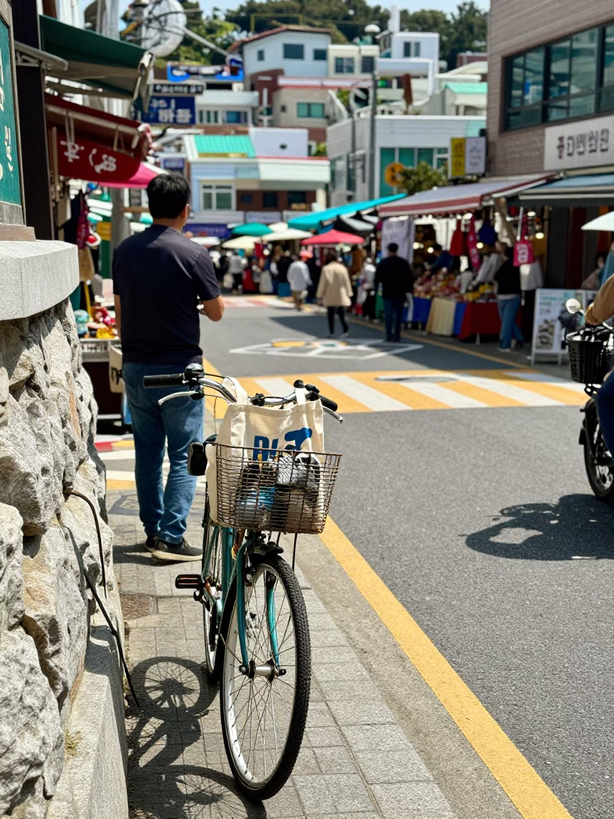 Busan Street Scene with Bicycle Basket and Local Market Details in in Busan, South Korea