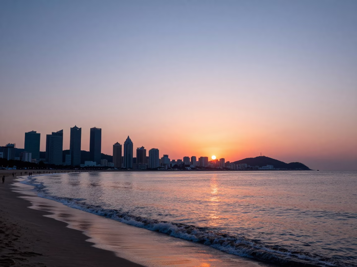 Busan Sunset Skyline and Haeundae Beach Horizon Shot with Traditional Korean Quilt in in Busan, South Korea