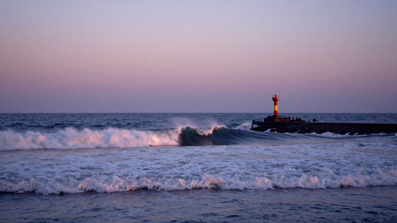 Busan Surf Breaking at The Early Evening Light in in Busan, South Korea