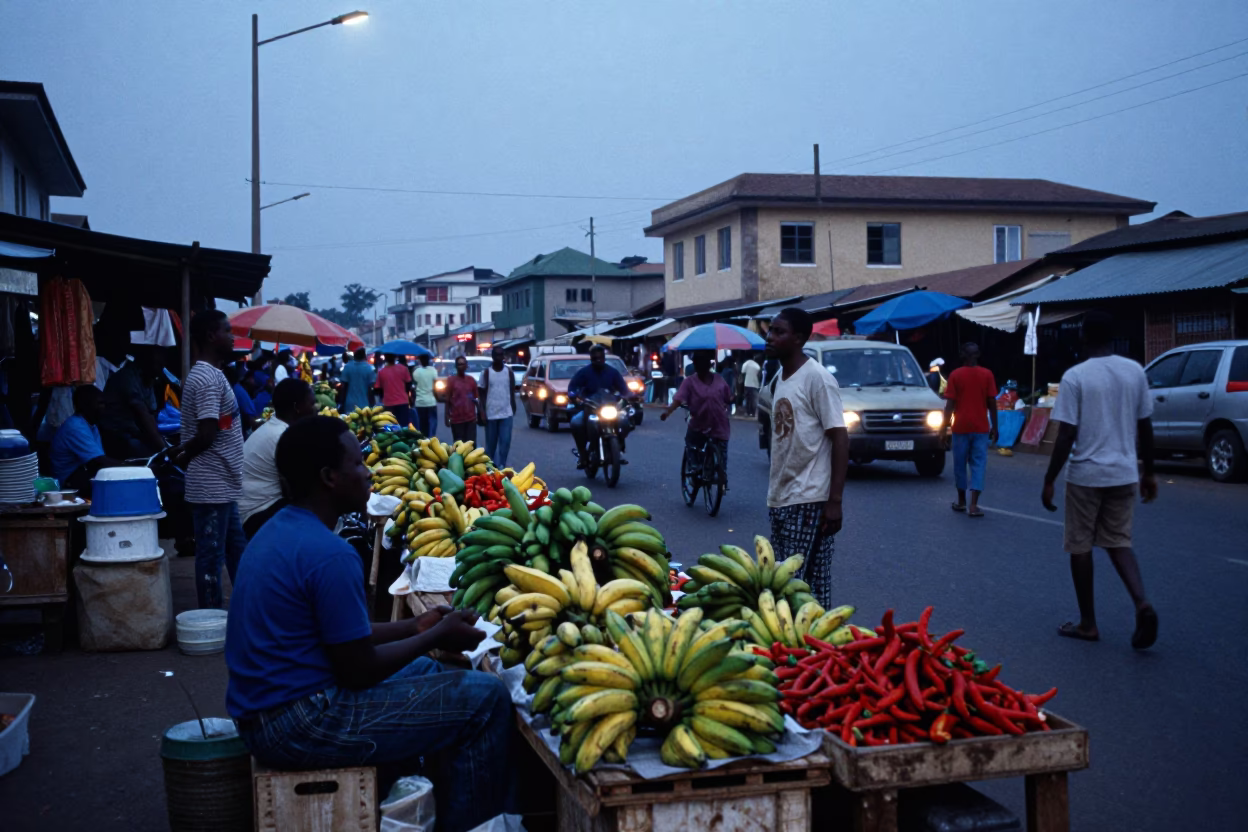 Busy Accra Ghana Street Market Scene at Nautical Dawn with Local Commerce in in Accra, Ghana