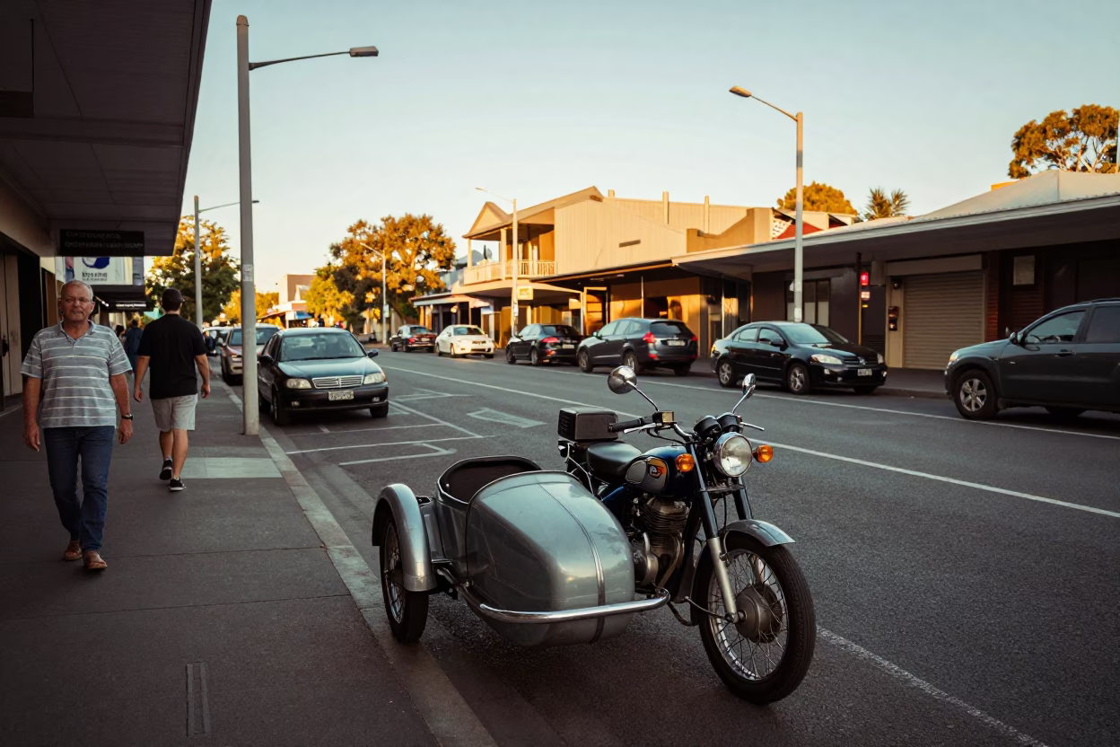 Busy Adelaide Street Corner Late Afternoon Life and Vintage Motorcycle Detail in in Adelaide, South Australia, Australia