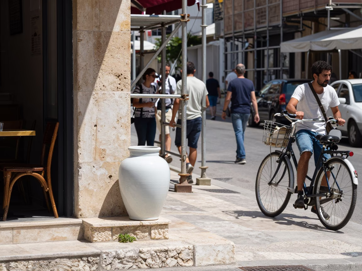 Busy Athens Street Corner Midday with Bicycle and Scaffolding in in Athens, Greece