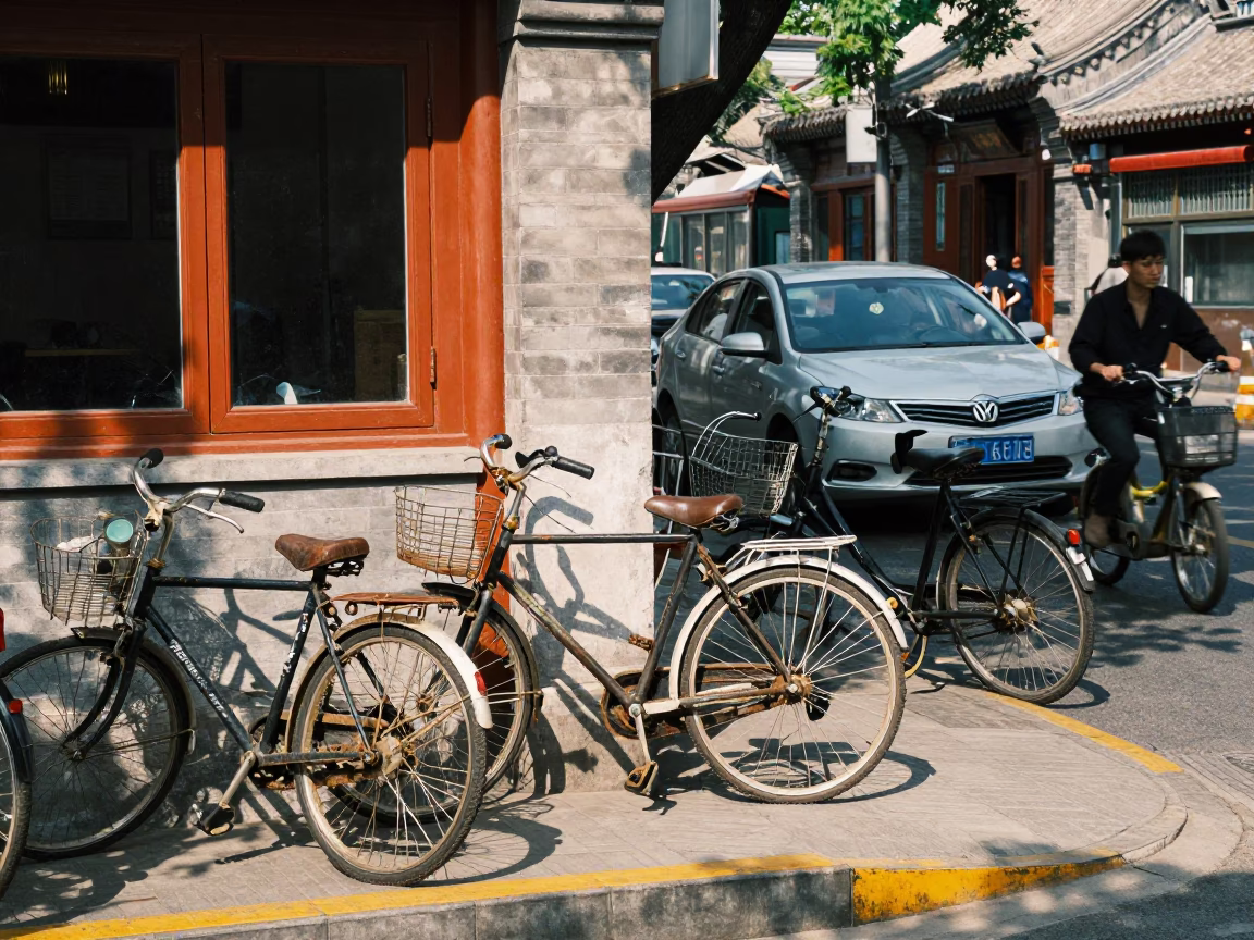Busy Beijing Street Corner Midday with Bicycle Traffic and Traditional Architecture in in Beijing, China