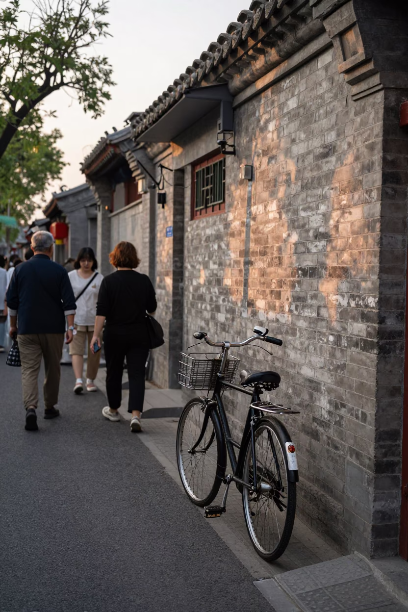 Busy Beijing Street Scene Late Afternoon with Bicycle and Traditional Architecture in in Beijing, China