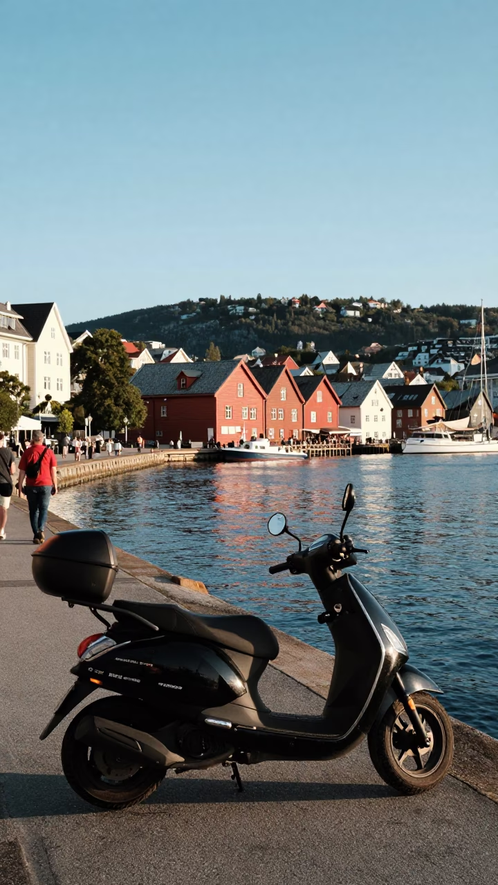 Busy Bergen Norway Harbor Promenade Late Afternoon Light Scooter and Local Life in in Bergen, Norway