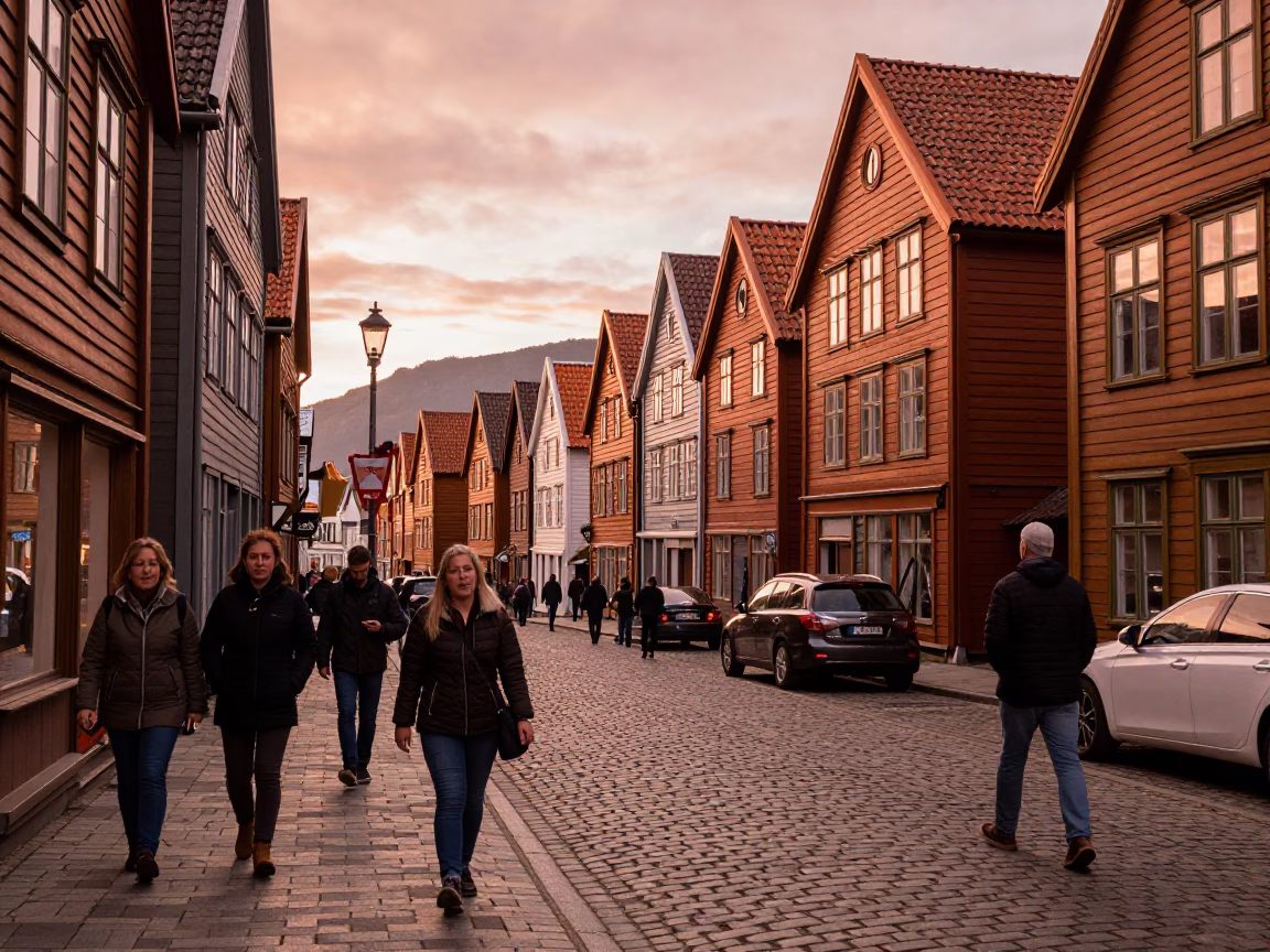 Busy Bergen Norway Street Scene with Cobblestone and Copper Dusk Light in in Bergen, Norway